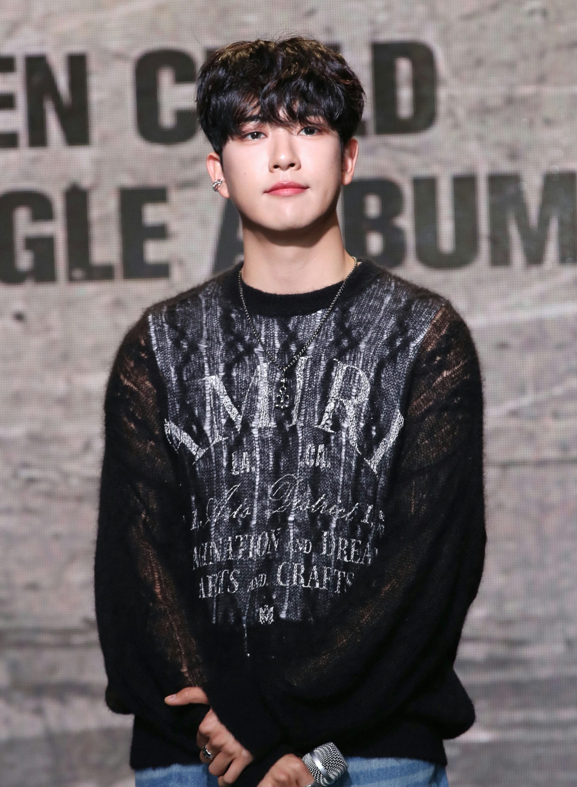 people-Juyeon (The Boyz)-black knitted sweater-A-silver chain necklace-B-ear cuff-C