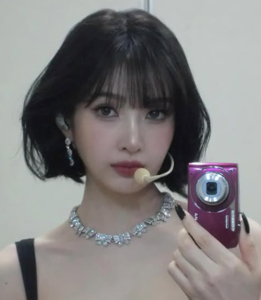 people-Momo (TWICE)-selfie-A-diamond necklace-B-short black hair-C-headset microphone