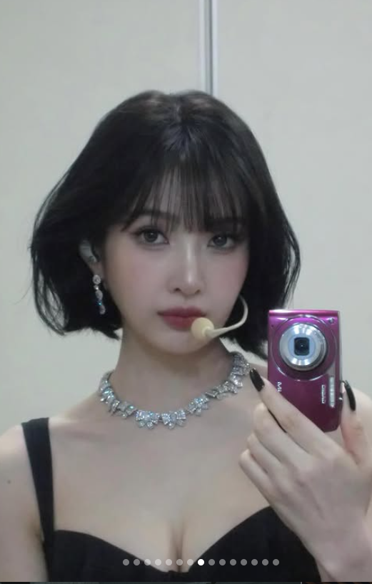 people-Momo (TWICE)-selfie-A-diamond necklace-B-short black hair-C-headset microphone