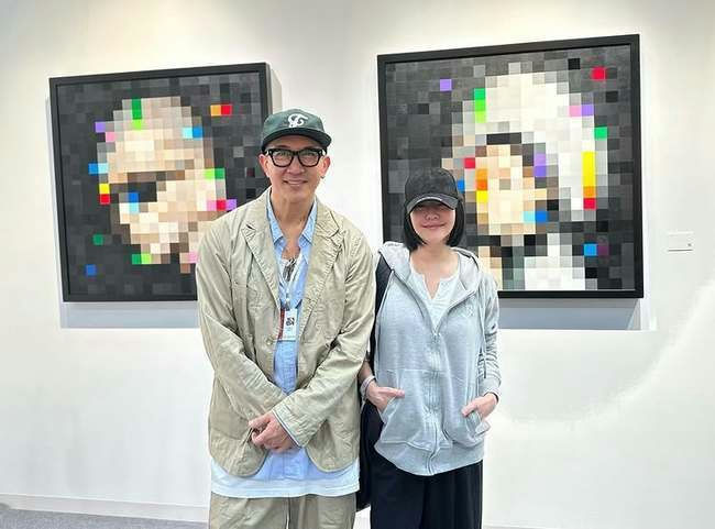 people-Man-and-Woman-A-Art-Exhibition-A-Pixelated-Portraits-B-Casual-Attire-C-Smiling