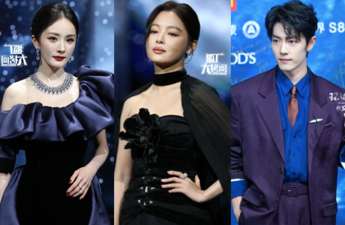 people-Yang Mi-A-navy blue off-the-shoulder ruffle dress-B-Amber Kuo-C-black strapless gown with floral detail and cape-D-Xiao Zhan-E-purple suit with blue shirt and brown tie