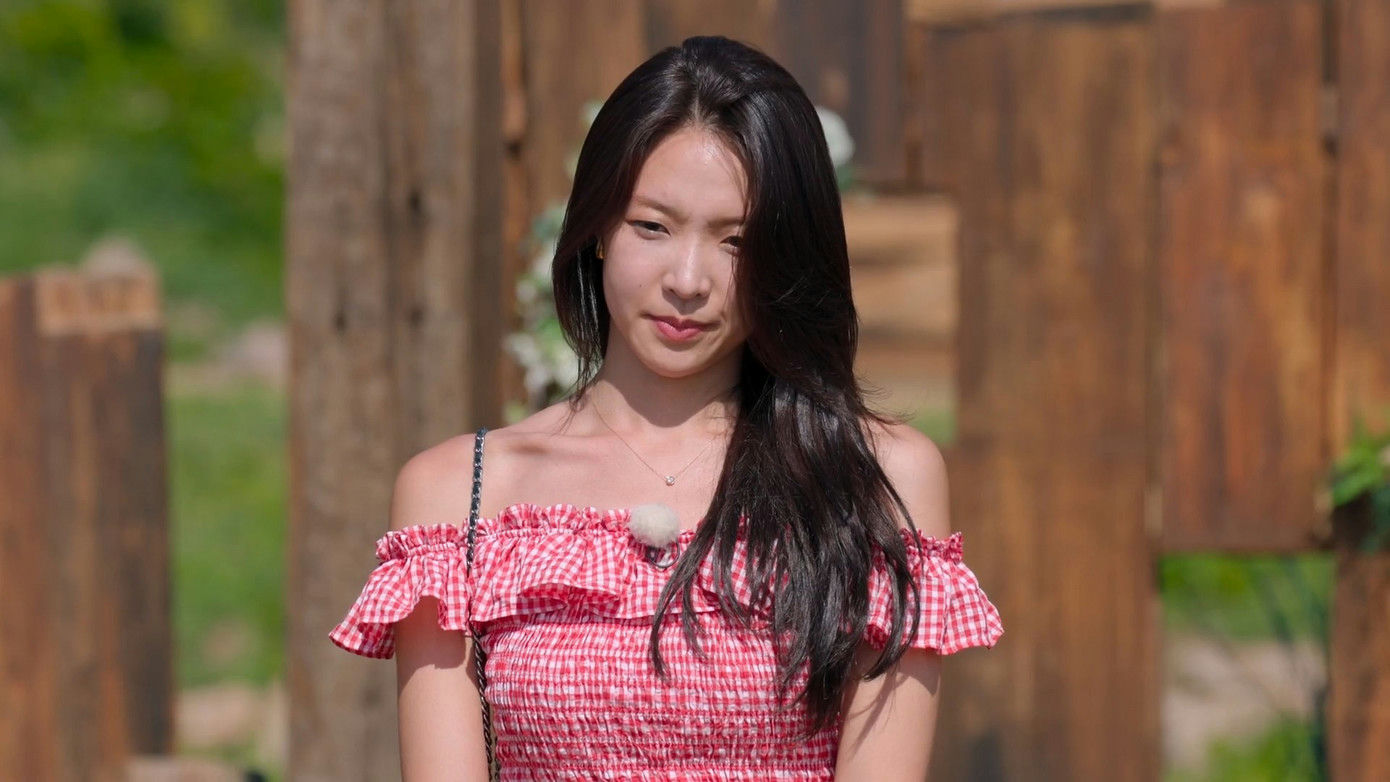 people-Woman-Red Gingham Off-the-Shoulder Top-Long Dark Hair-Outdoor Setting-Subtle Jewelry