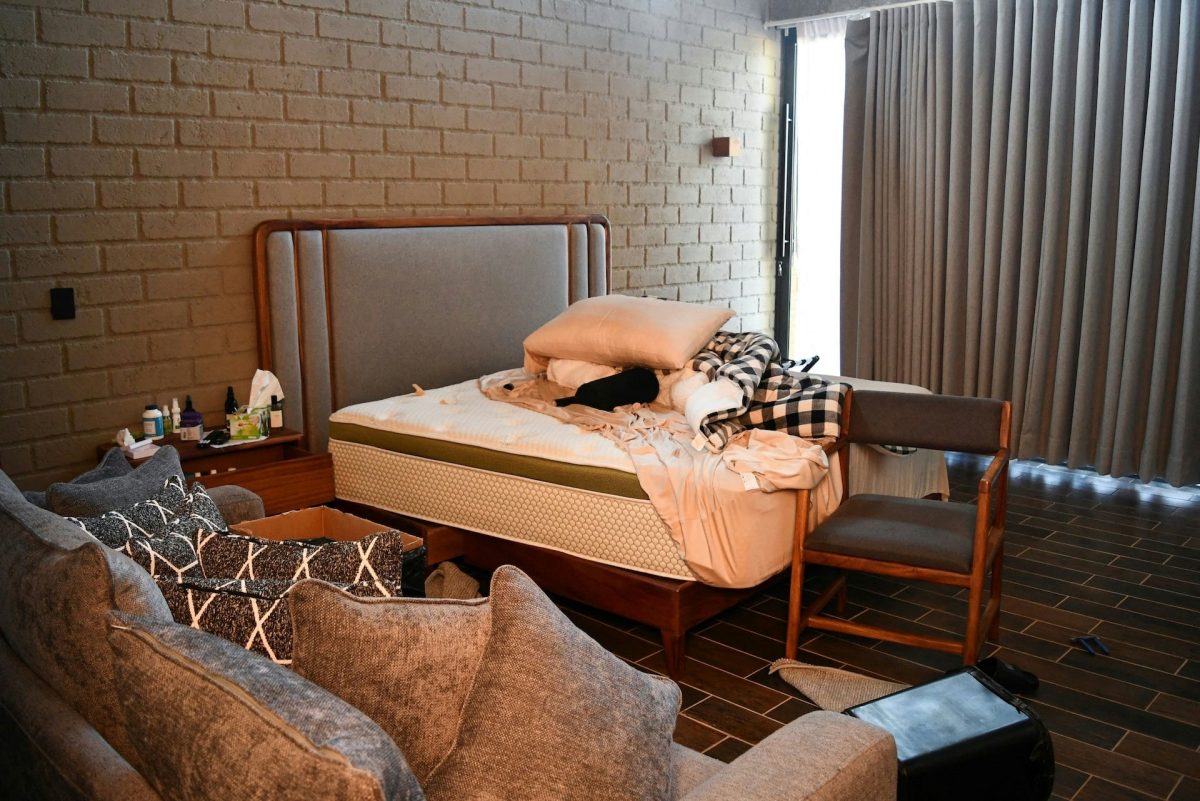 people-No person is visible-A-messy room-A-unmade bed-A-brick wall