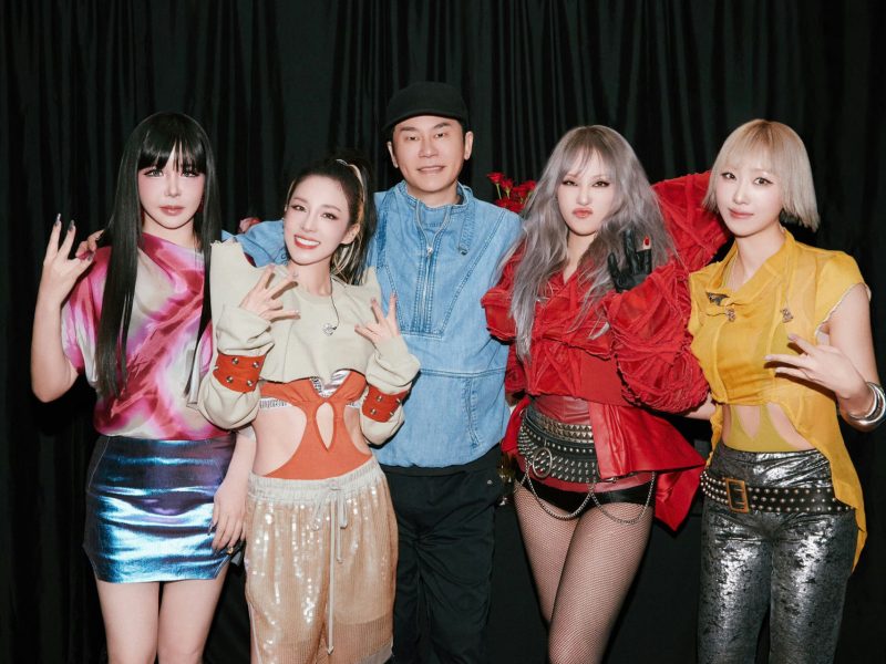 people-4 women and 1 man-K-pop-A-pop group-A-denim outfit-A-red outfit-A-metallic skirts and pants-A-stage performance attire