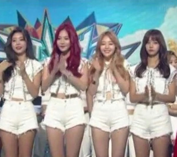 people-4 women-Kpop group-Apink-white outfits-short shorts-stage performance
