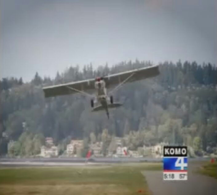 people-None-airplane-A-landing-A-runway-B-KOMO 4 news graphic-C