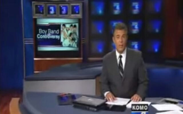 people-News anchor-A-News broadcast-A-KOMO 4-A-Boy Band Controversy-A-Studio setting-B-Suit and tie-C