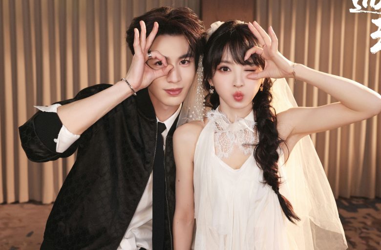 people-Chinese celebrity couple-A-wedding attire-A-playful pose-B-Gucci jacket-C-white bridal dress