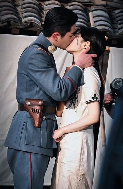 people-Xiao Zhan-in uniform-A-Chinese actress-A-kissing-B-filming a scene-C