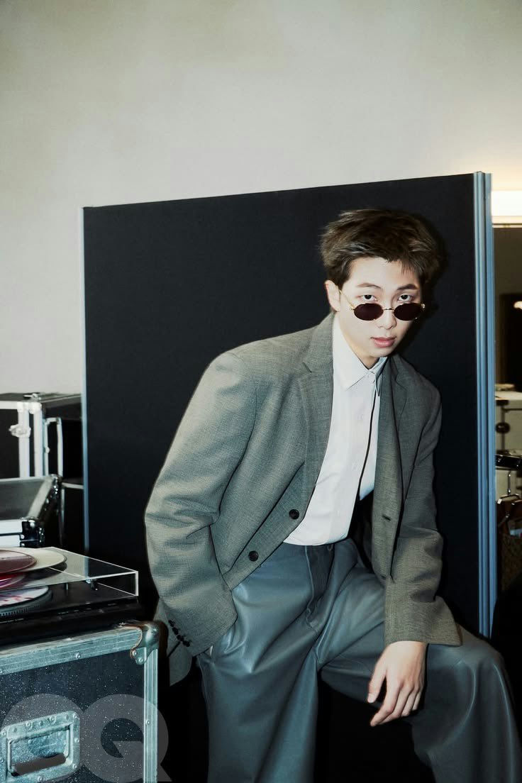 people-RM (Kim Namjoon)-suit jacket-sunglasses-leather pants-vinyl record player