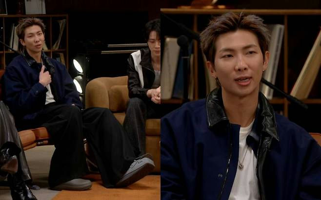 people-RM (Kim Namjoon)-sitting-A-blue jacket-A-black pants-A-interview setting