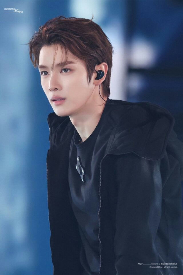 people-Sungchan-Kpop-idol-A-black-hoodie-A-in-ear-monitor-A-stage-performance