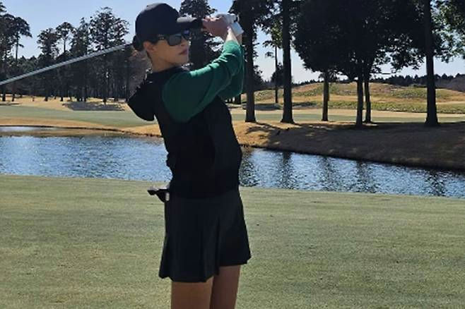 people-Unknown-golfer-A-outdoors-A-golf course-A-sunny day
