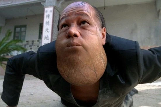 people-Man with large, swollen neck/throat-performing pushup/crouching-Film character/Actor-Kung Fu Hustle-The Toad Villain