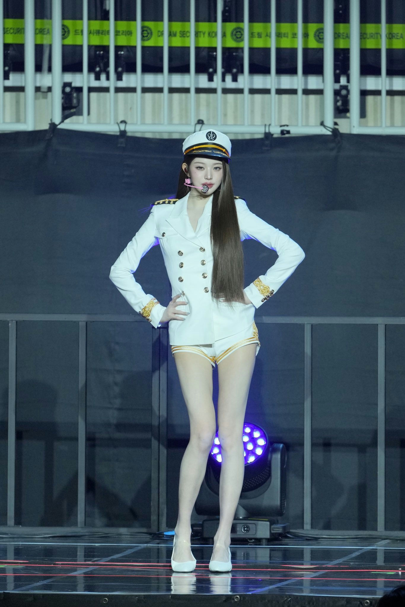 people-Jang Wonyoung (IVE)-idol-white military-style outfit-cap-long straight hair-on stage