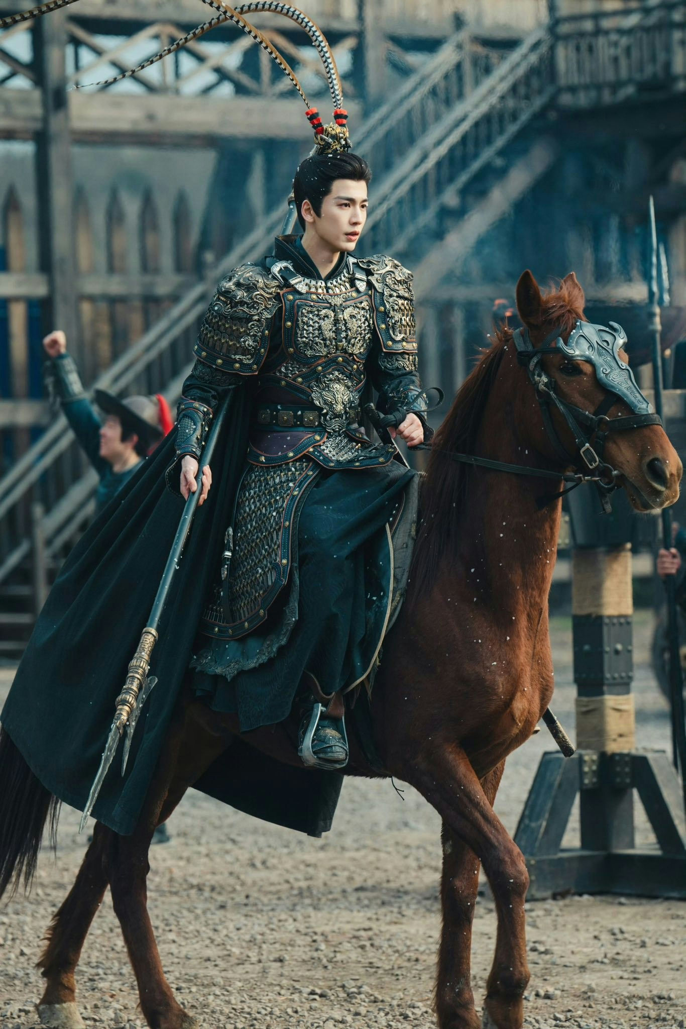 people-Actor Bai Lu-Actor Bai Jingting-Male warrior on horseback-Ornate armor-Feathered helmet ornament-Spear-Brown horse-Outdoor setting