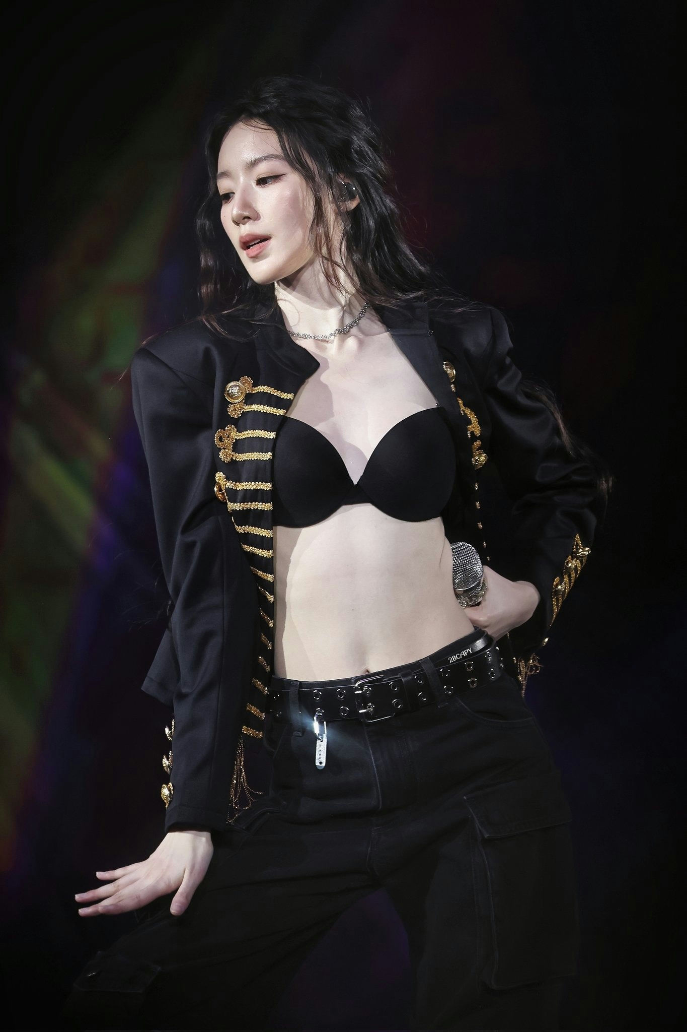 people-Kim Tae-yeon-performer-A-stage outfit-A-black bra top-A-military-style jacket-A-cargo pants