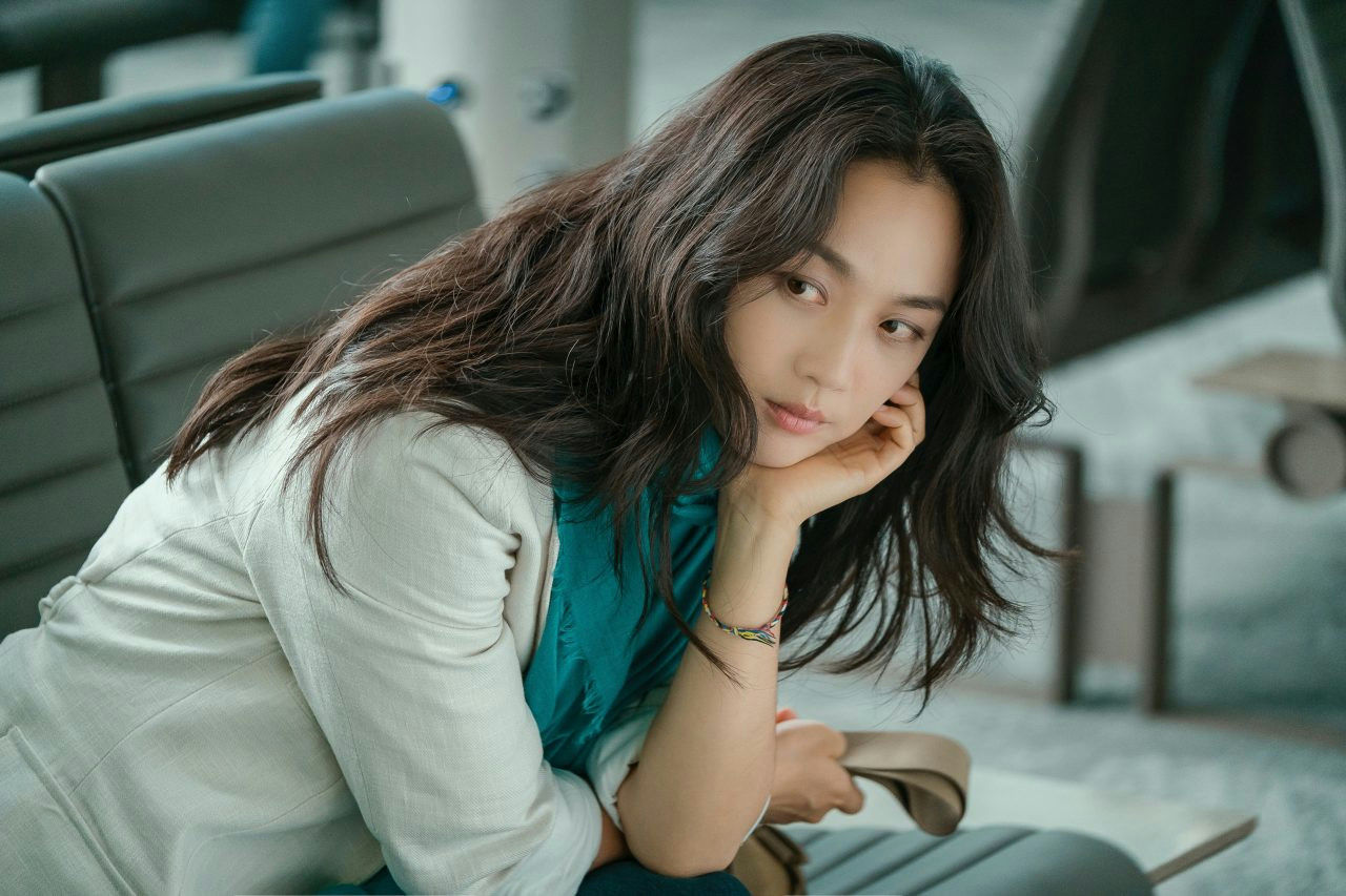 people-Shin Min-a-pensive-indoor-long dark hair-turquoise scarf-light jacket