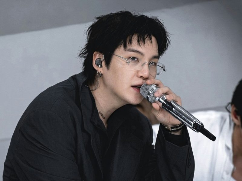 people-Min Yoongi (Suga/Agust D)-A-holding microphone-A-wearing glasses-B-wearing in-ear monitors-C-black attire