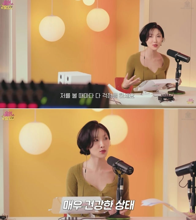 people-Korean actress Kim Go-eun-talking in a podcast-wearing a mustard-colored top-in a yellow room