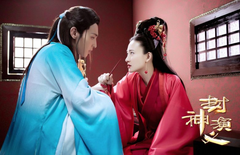 people-Two actors in traditional Chinese costume-A-Intense gaze-A-Red and blue robes-B-Chinese characters/logo-C-Dramatic lighting