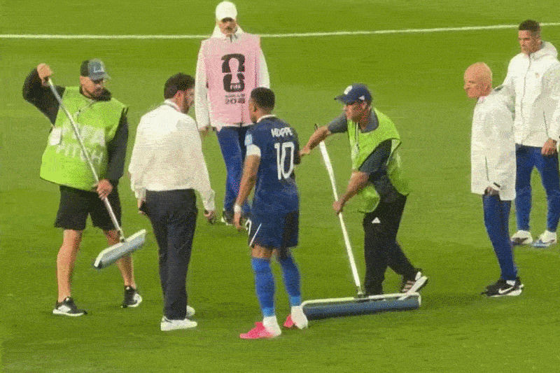 kylian mbappe waterlogged pitch