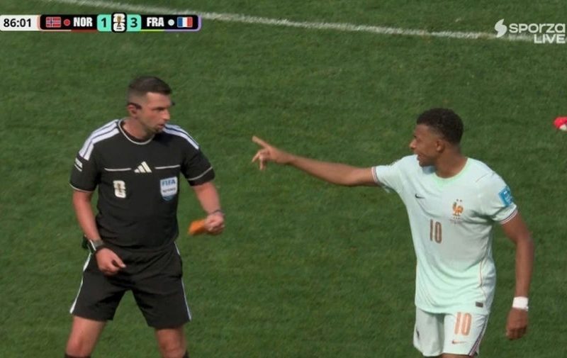 kylian mbappe captain armband referee
